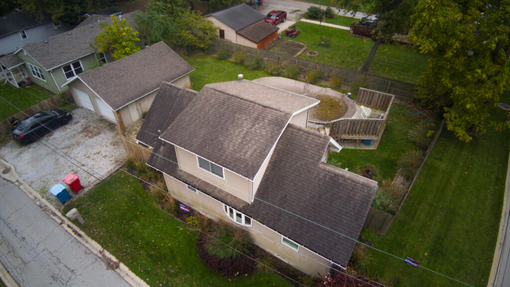 drone roof inspection Indiana capturing aerial view of residential roof for damage assessment