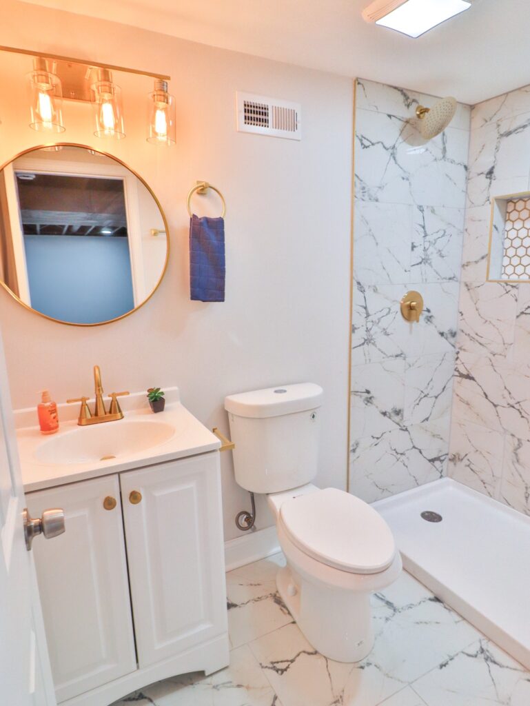 Ivan's basement bathroom marble shower