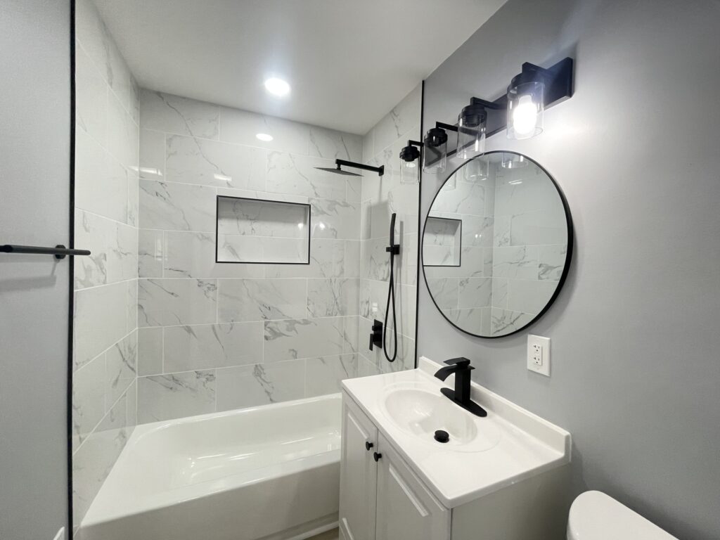 bathroom remodel black fixtures marble