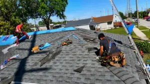Roof replacement contractor Indiana discussing roofing options with a homeowner